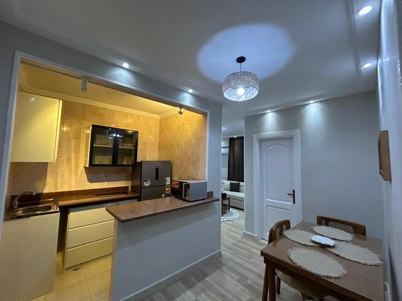 Skyline Luxury Suites 5 Mins From Cairo Airport Exterior photo